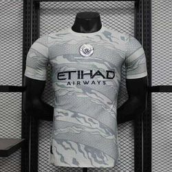 Camisa Manchester City 23/24 Jogador - Ano do Drag... - GOAT SPORTS