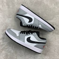 Tênis Air Jordan 1 Low - Cinza, Preto - AIRJ1 - GOAT SPORTS