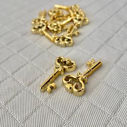 Aplique Dourado Chave 1,5x3,0cm - pacote com 10 un... - CHAMMA FESTA