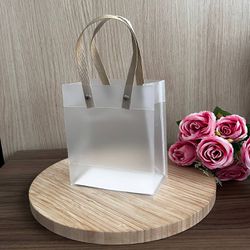 Sacola de Plástico PVC Leitosa C/Alça Kraft - 13X1... - CHAMMA FESTA