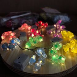 FIO LED GIRASSOL 1 MT UN LUZ AMAR. CORES - 021563 - CHAMMA FESTA
