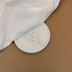BRINCO ARGOLA INFINITO ( 5,3 X 1,7CM) FIO ARREDOND... - C Martiniano Joias