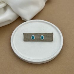 BRINCO ZIRCÔNIA GOTA ÁGUA MARINHA GALERIA CRAVEJAD... - C Martiniano Joias