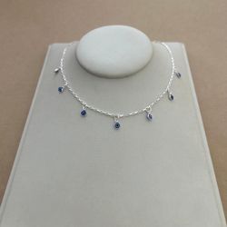 CHOKER 7 OLHO GREGO PEQUENO AZUL ESCURO COM BORDA ... - C Martiniano Joias