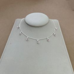 CHOKER 7 ZIRCÔNIA REDONDA ROSA CLARO PENDURADAS EL... - C Martiniano Joias