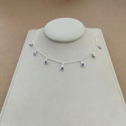 CHOKER COM 7 ZIRCÔNIAS LILAS COM BORDA PENDURADAS ... - C Martiniano Joias