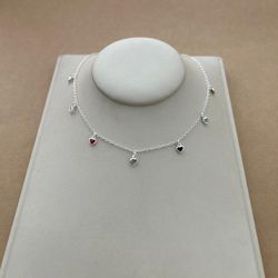 CHOKER COM 7 CORAÇÕES DE ZIRCÔNIA COLORS PENDURADA... - C Martiniano Joias