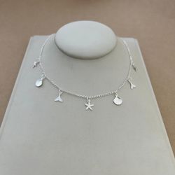 CHOKER ESTRELAMAR, RABO DE SEREIA E CONCHAS ELOS 3... - C Martiniano Joias