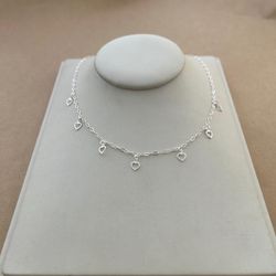 CHOKER COM 7 CORAÇÕES PEQUENOS VAZADOS PENDURADOS ... - C Martiniano Joias