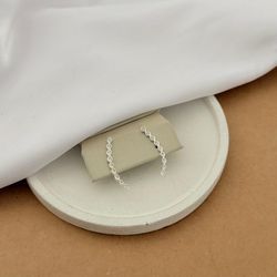 BRINCO EAR CUFF TRANÇADO COM 7 ZIRC NAVETE CRISTAL... - Paraíso da Prata