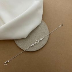 PULSEIRA 3 TREVOS ZIRCÔNIA CRISTAL COM BORDAS ELOS... - C Martiniano Joias