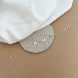 PULSEIRA 2 DUPLAS CORAÇÕES VAZADOS 3 ZIRCÔNIAS COL... - C Martiniano Joias