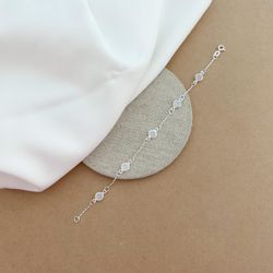 PULSEIRA COM 5 ZIRCÔNIAS LEITOSA BORDA ARGOLINHA C... - C Martiniano Joias