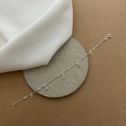PULSEIRA COM ZIRCÔNIAS REDONDAS CRISTAL E ROSA PEN... - C Martiniano Joias