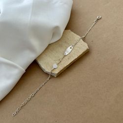 PULSEIRA INFANTIL PLAQUINHA NAVETE LISA COM CORAÇÃ... - C Martiniano Joias
