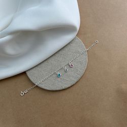 PULSEIRA INFANTIL COM ZIRCÔNIAS ROSA, CRISTAL, AZU... - C Martiniano Joias