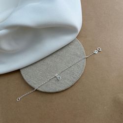 PULSEIRA INFANTIL COM 1 ZIRCÔNIA CRISTAL PENDURADA... - C Martiniano Joias