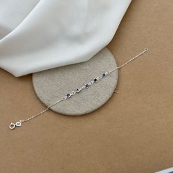 PULSEIRA 5 OLHO GREGO BORDA ARGOLINHA CARTIER - 26... - Paraíso da Prata