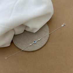 PULSEIRA 1 OLHO GREGO 2 ZIRCÔNIA CRISTAL COM BORDA... - C Martiniano Joias