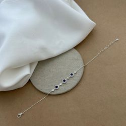 PULSEIRACOM ZIRCÔNIA REDONDA SAFIRA LATERAL CRAVEJ... - C Martiniano Joias