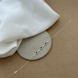 PULSEIRA COM 3 ZIRCÔNIAS OVAIS ROSA LATERAL CRAVEJ... - C Martiniano Joias