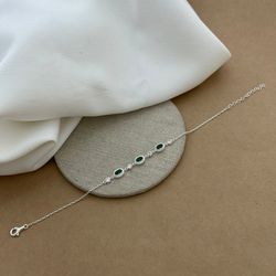 PULSEIRA COM 3 ZIRCÔNIAS OVAIS ESMERALDA LATERAL C... - C Martiniano Joias