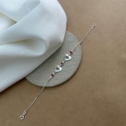PULSEIRA COM 2 CORAÇÕES LARGOS VAZADOS E 3 CORAÇÕE... - C Martiniano Joias