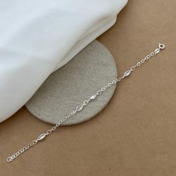 PULSEIRA COM 4 ZIRCÔNIAS NAVETE CRISTAL ELOS ARRED... - C Martiniano Joias