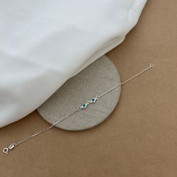 PULSEIRA 1 CORAÇÃO ZIRCÔNIA AZUL CLARO CARTIER 18C... - C Martiniano Joias