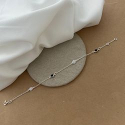 PULSEIRA COM ZIRCÔNIA REDONDA BRANCA E PRETO COM B... - Paraíso da Prata