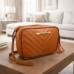 Larissa Caremelo - Debora Ribeiro Bolsas