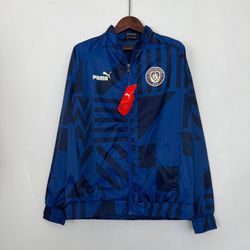 Jaqueta Corta Vento Manchester City 2023 - Azul - ... - CATALOGO