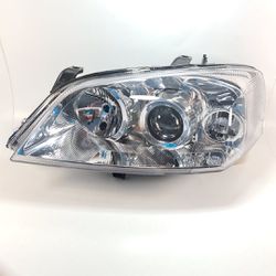 Farol Esquerdo Astra Original Arteb - 0160549 - 79... - Franpel Distribuidora de Peças Automotivas
