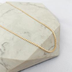 Colar Longo Bolinhas Achatadas Finas Folheado em O... - IAIÁ Semijoias