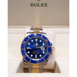 ROLEX AUTOMÁTICO PRATA FUNDO AZUL DETALHES DOURADO... - GRINGA TOP MIL