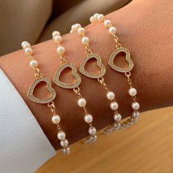Pulseira de perola com coração (CADA) - P3422 - Lojas das Revendedoras
