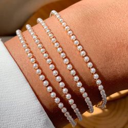 Pulseira de perolas delicadas - P3435 - Lojas das Revendedoras