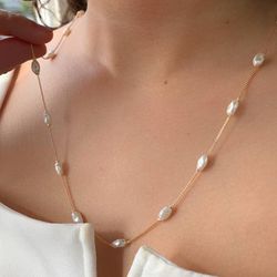 Colar alongado de pérolas - C8557 - Lojas das Revendedoras