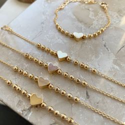 Pulseira de esfera com coração infantil (cada) - P... - Lojas das Revendedoras