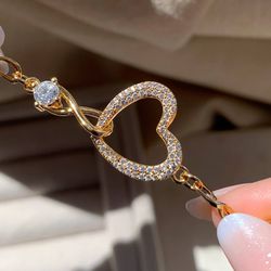 Pulseira De Coração cravejado Com infinito - P01 - Lojas das Revendedoras