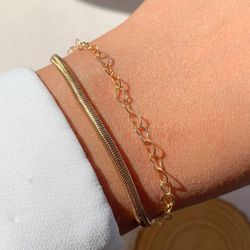 Pulseira dupla de malha com coração vazado - P03 - Lojas das Revendedoras