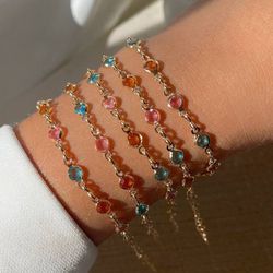 Pulseira trabalhada na zircônia colorida (cada) - ... - Lojas das Revendedoras