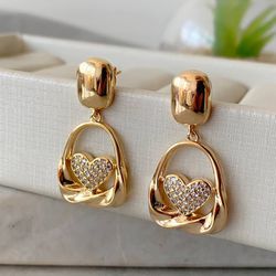 Brinco de argola com detalhe de coração cravejado ... - Lojas das Revendedoras
