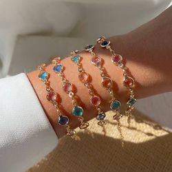 Pulseira trabalhada na zircônia colorida - P77 - Lojas das Revendedoras