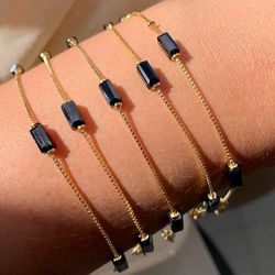 Pulseira com detalhes pretos (cada) - P3307 - Lojas das Revendedoras