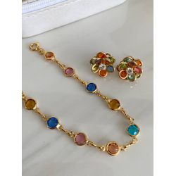 Conjunto de pulseira colorida com brinco de flor e... - Lojas das Revendedoras