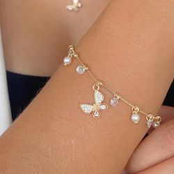 Pulseira de borboleta com ponto de luz e perolas ... - Lojas das Revendedoras
