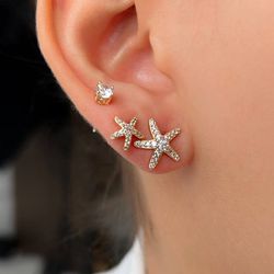 Trio de brinco de estrela cravejada com ponto de l... - Lojas das Revendedoras