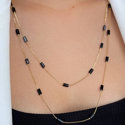 Colar alongado com detalhes pretos 60cm (cada) - C... - Lojas das Revendedoras