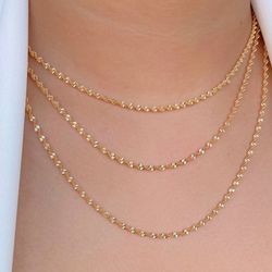 Colar de fita torcida (cada) - C15797 - Lojas das Revendedoras